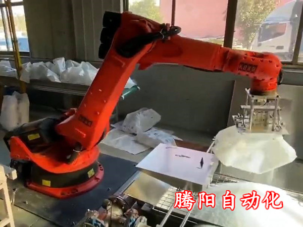 氧化鐵拆包機(jī)械手